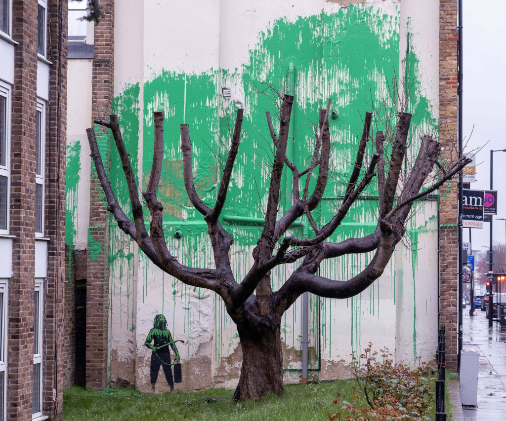Banksy Hornsey Road tree mural in Finsbury Park, London