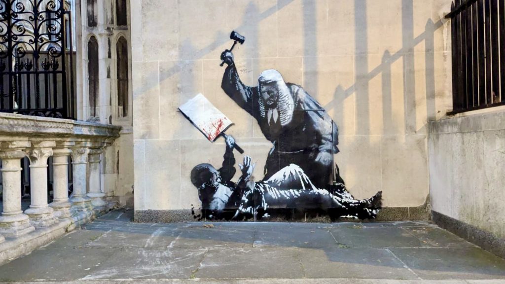 Banksy mural at the Royal Courts of Justice in London