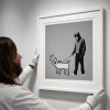 Banksy Choose Your Weapon silver screen print Pest Control authenticated GraffitiStreet